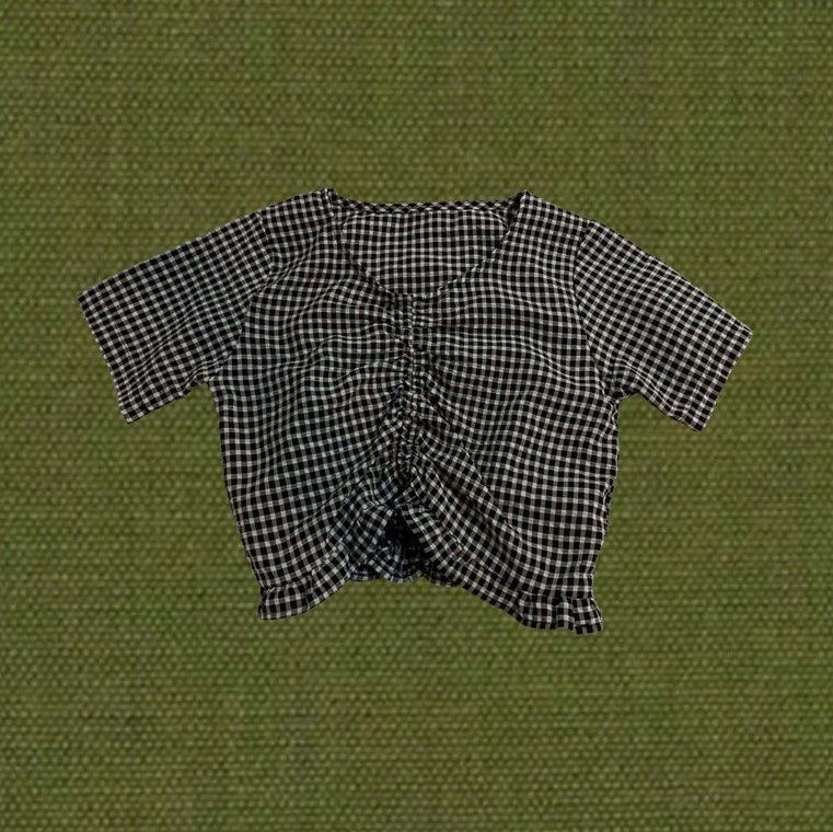 Checkered V-Neck Short Sleeve Top (Category: Shirts) located in Manila. Submitted by sugarcane888 (Listing ID 1466701482, Image 1). Description: ⭐️ SHEIN - Checkered V-Neck Short Sleeve Top 📌 Fits S - M 📌 In good condition.