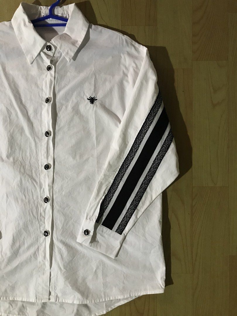 Christian Dior (Category: Luxury Apparel) located in Iriga City. Submitted by thrift_dshph (Listing ID 1466576384, Image 2). Description: Christian Dior Polo Long Sleeve Dimes: 23x27-28 Colorate: 9.9/10 Like new condition No hidden issue.