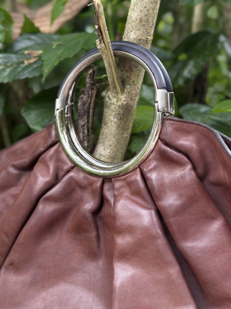 Christian dior babe bag (Category: Luxury Bags & Wallets) located in Lantapan. Submitted by shanielsumatra16 (Listing ID 1466582764, Image 2). Description: Christian doir soft Babe handbag John galliano era Issue: typical sign of use see pics Dm or make an offer.