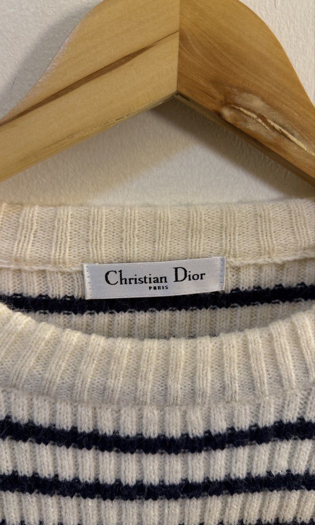 Christian Dior Striped Cotton Sweater (Category: Longsleeves) located in Paranaque City. Submitted by preluxeshop_ph (Listing ID 1466761700, Image 3). Description: Christian Dior Striped Cotton Sweater - Brand: Christian Dior - Material: 100% Cotton - Features: Button details on the shoulder - Design: Ribbed cuffs and hem - Style: Chic, casual, perfect for layering L: 24” W: 20”.