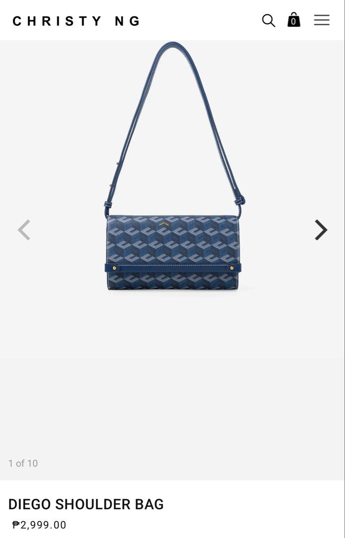 Christy Ng Diego Shoulder Bag (Category: Shoulder Bags) located in Malabon City. Submitted by tinxoxo (Listing ID 1466597411, Image 1). Description: - Brand: Christy Ng ORIGINAL - Style: Diego shoulder bag in blue with geometric exterior pattern - Hardware & Closure: Gold-tone hardware with secure magnetic snap flap closure - Details: Stylish contrast white stitching along edges and strap - Interior: Main compartment equipped with built-in card s