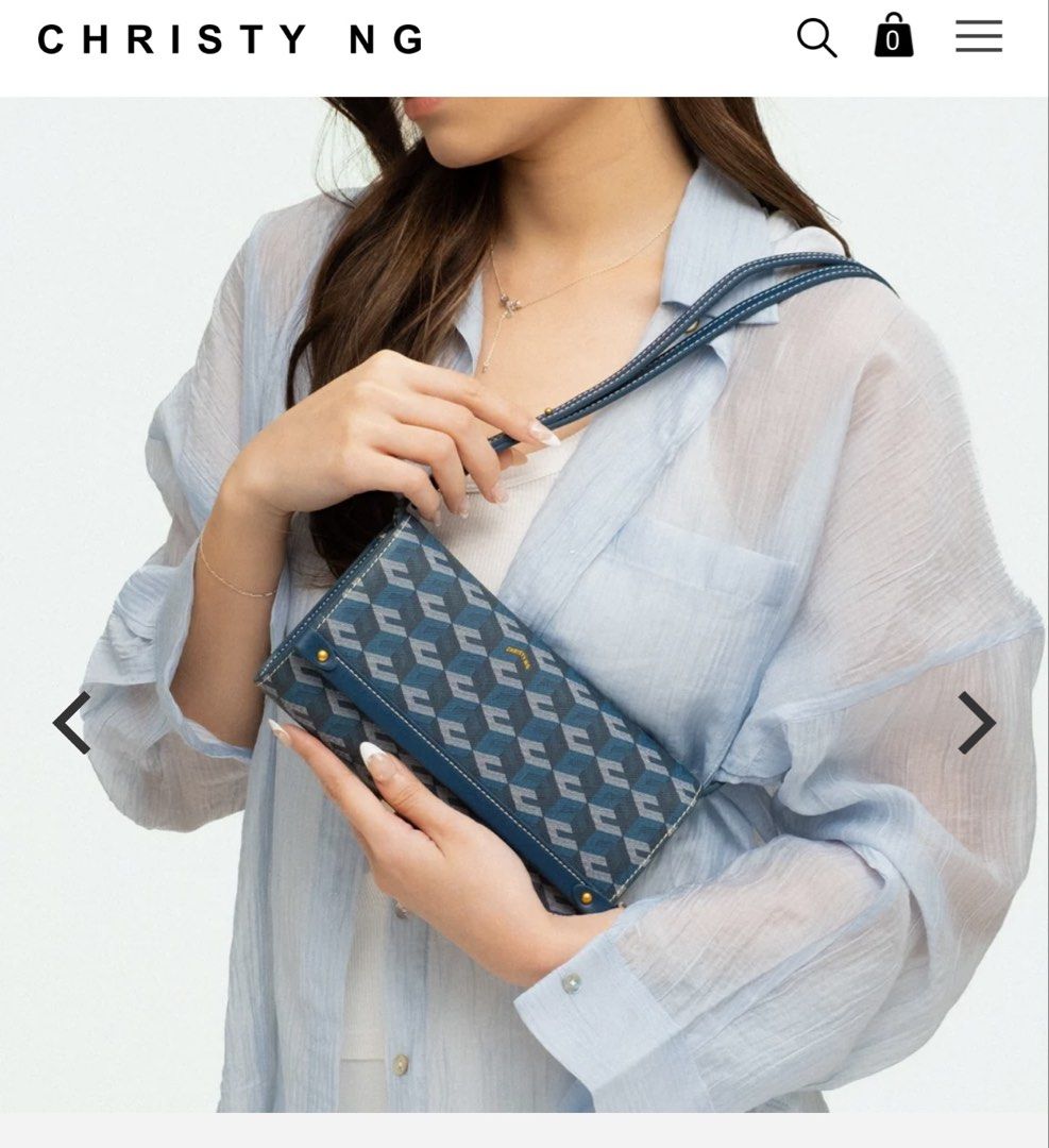 Christy Ng Diego Shoulder Bag (Category: Shoulder Bags) located in Malabon City. Submitted by tinxoxo (Listing ID 1466597411, Image 2). Description: - Brand: Christy Ng ORIGINAL - Style: Diego shoulder bag in blue with geometric exterior pattern - Hardware & Closure: Gold-tone hardware with secure magnetic snap flap closure - Details: Stylish contrast white stitching along edges and strap - Interior: Main compartment equipped with built-in card s