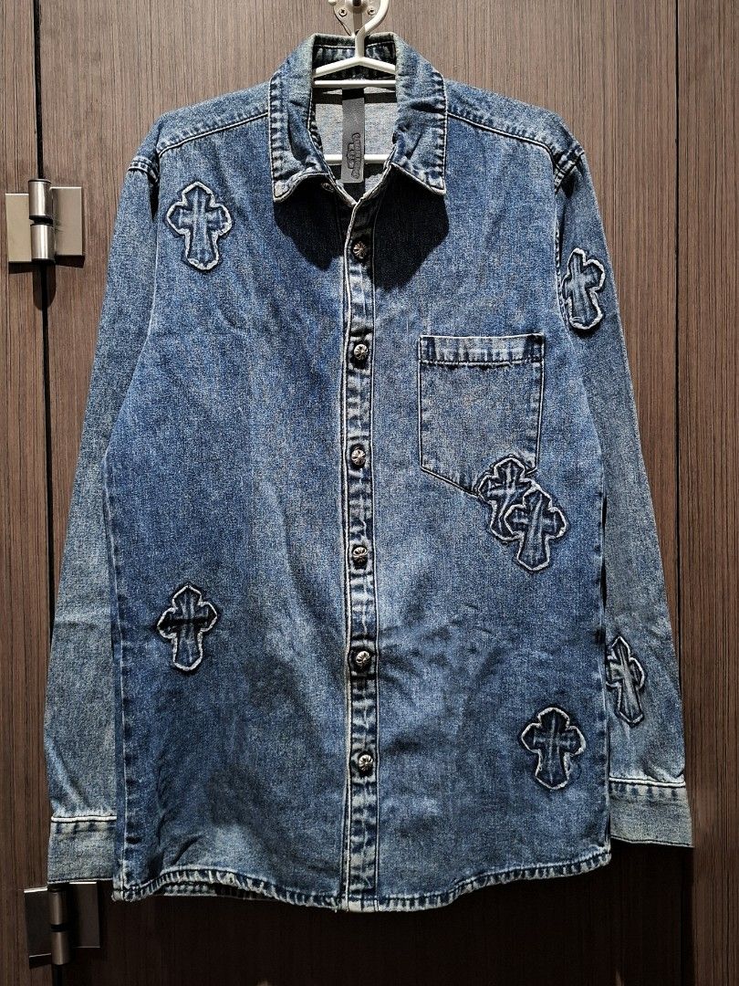 Chrome Hearts Denim Cross Patch Blue Work Shirt Jacket (Category: Coats, Jackets and Outerwear) located in Pasig City. Submitted by coveted.mnl (Listing ID 1466648117, Image 1). Description: In Pristine Condition📌 Best fit to: Large Width : 20 Length : 29 (MEASURED BY INCHES) 9.5/10 overall condition No issues or flaws in fabric • P4800 Slightly negotiable • Pasig City meet up • Open for COD Via Lalamove or Grab • J&T courier Message us for more