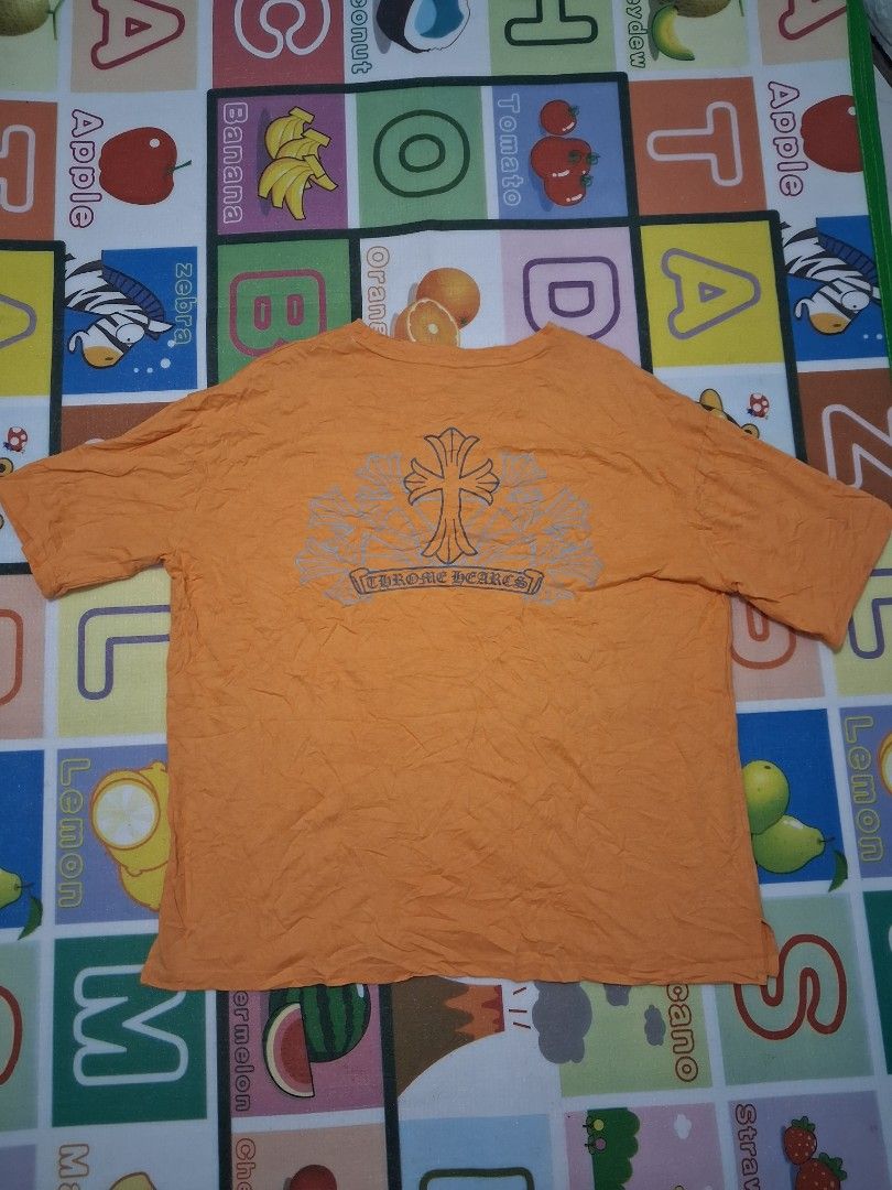 Chrome Hearts Orange Cross Pocket Graphic Tee (Category: Tshirts & Polo Shirts ) located in Manila. Submitted by rossthrift (Listing ID 1466761347, Image 2). Description: - Brand: Chrome Hearts - Color: Vibrant Orange - Size: Small - Fit: Relaxed fit with classic crew neckline - Design: Front chest pocket with small cross graphic & large matching cross logo on the back - Condition: Brand new / Excellent quality - Perfect for daily streetwear styl