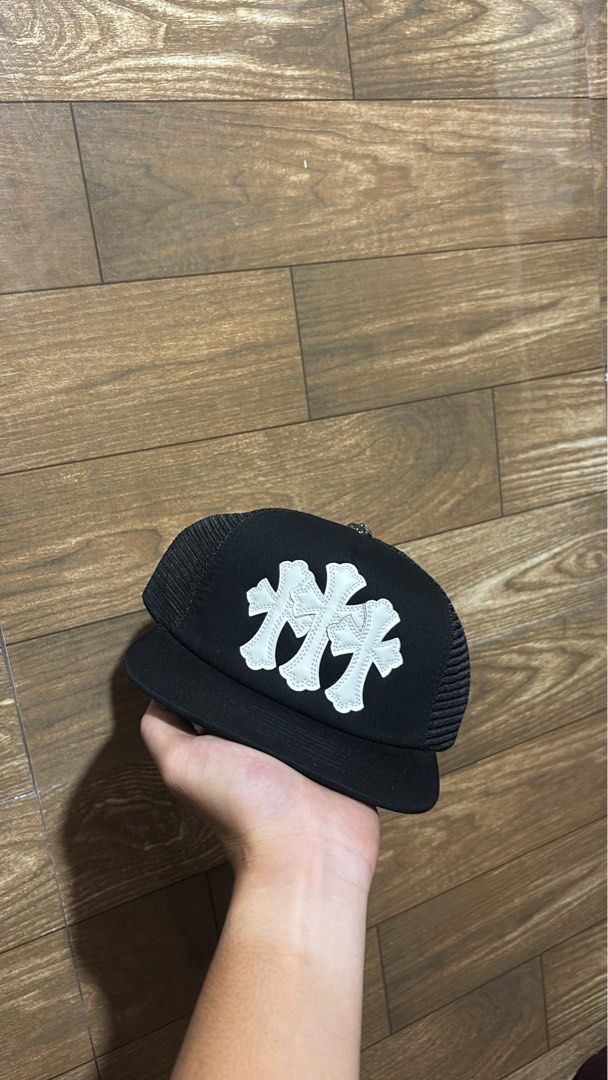 Chrome Hearts Trucker Hat Black White Cross (Category: Caps & Hats) located in Batangas. Submitted by franzbucal (Listing ID 1466608196, Image 1). Description: 600 EACH - Brand: Chrome Hearts - Color: Classic Black and White - Condition: Brand new, never worn, includes original interior cardboard shape retainer - Features: Iconic cross patches on the front, breathable mesh back panels - Fit: Adjustable snapback closure - Details: Authentic interi