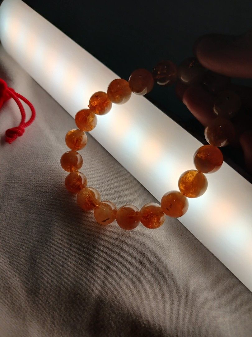 Citrine Stone Bracelet (Category: Bracelets) located in Pasig City. Submitted by carmelaelizalde (Listing ID 1466747343, Image 3). Description: RFS: gift sana, but i changed my mind and don't want to keep for myself since it's too big on my wrist Orig price: 700 php at a pop up store in Trinoma Mall Comes with a red pouch.