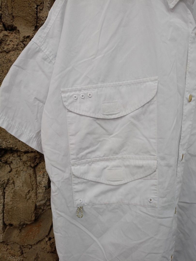 Cólúmbiá White Polo Shirt" (Category: Tshirts & Polo Shirts ) located in Manila. Submitted by robco (Listing ID 1466564721, Image 3). Description: Cólúmbiá White Polo Shirt" Length in Front - 30.5 Width - 23.5 Size - L-XL Color rate - 9.5/10 Excellent Condition Issue - Needwash, altered & yellow stains MINE - 150 #ukayukay #ukayukayphilippines #bidding #Columbiapoloshirt.