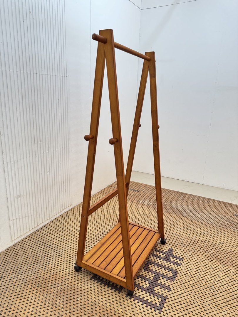 Clothes Rack (Category: Other Home Furniture) located in Quezon City. Submitted by matetdevis13 (Listing ID 1466703725, Image 2). Description: Vintage Wooden Mobile Coat & Clothes Rack Price: 4,200 L33 x W17.5 x H61 In good condition Code JMD13-M242.
