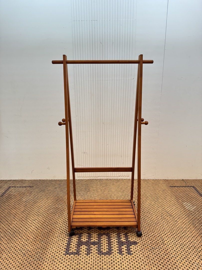 Clothes Rack (Category: Other Home Furniture) located in Quezon City. Submitted by matetdevis13 (Listing ID 1466703725, Image 1). Description: Vintage Wooden Mobile Coat & Clothes Rack Price: 4,200 L33 x W17.5 x H61 In good condition Code JMD13-M242.