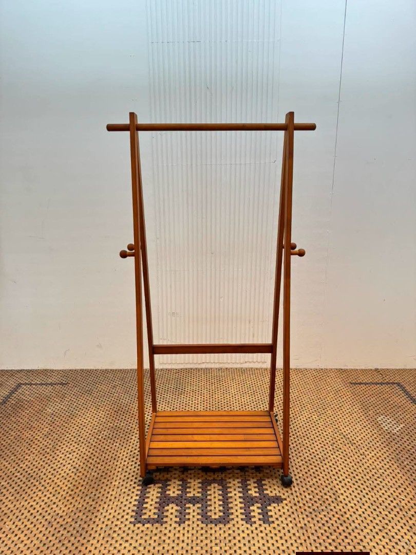 Clothes Rack (Category: Other Home Furniture) located in Meycauayan. Submitted by marygracecasimiro (Listing ID 1466713596, Image 1). Description: Vintage Wooden Mobile Coat & Clothes Rack Price: 5,200 L33 x W17.5 x H61 In good condition🩷.