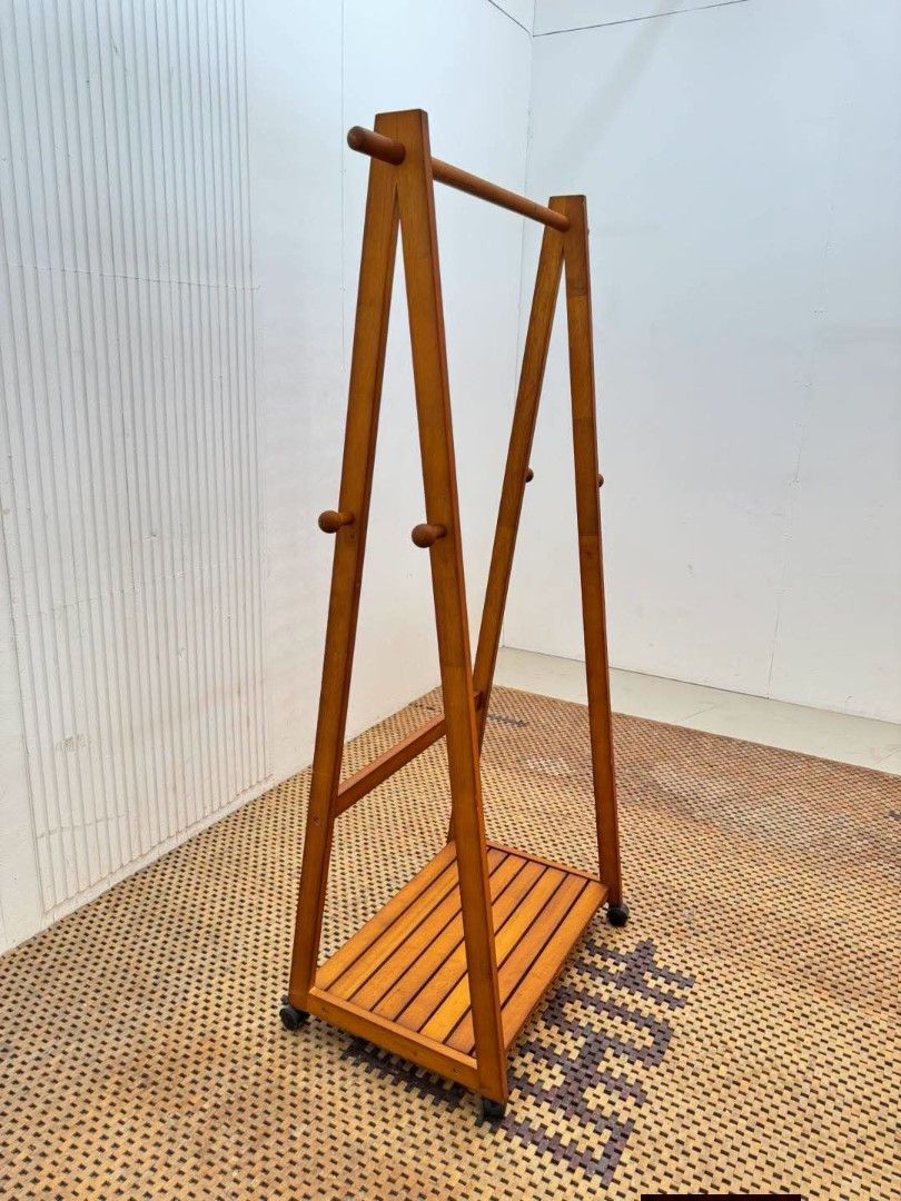 Clothes Rack (Category: Other Home Furniture) located in Meycauayan. Submitted by marygracecasimiro (Listing ID 1466713596, Image 2). Description: Vintage Wooden Mobile Coat & Clothes Rack Price: 5,200 L33 x W17.5 x H61 In good condition🩷.