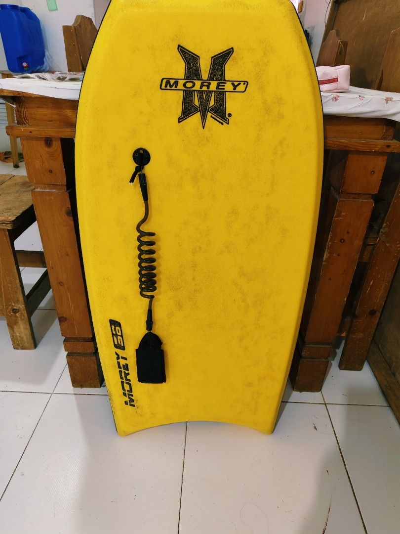 Cloud Nine Yellow Bodyboard with Cover (Category: Water Sports) located in Bulacan. Submitted by babz30261 (Listing ID 1466647301, Image 2). Description: - Brand: Cloud Nine - Color: Bright yellow - Inclusions: Comes with a protective cover - Condition: Sturdy build, shows some dirt marks and signs of previous use - Best for: Beach trips and weekend surf sessions.