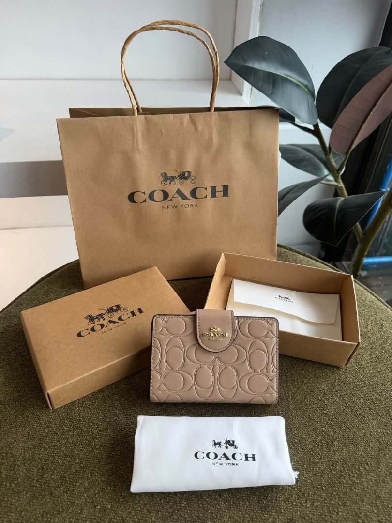 Coach Bifold Wallet (Category: Wallets & Card holders) located in Quezon City. Submitted by bagsboutiqueph (Listing ID 1466770587, Image 3). Description: LAST PRICE POSTED. LIMITED STOCKS! BRANDNEW WITH INCLUSIONS. COLOR MAY SLIGHTLY VARY IN ACTUAL DUE TO LIGHTING AND CAMERA SETTING. OTHER PHOTOS WILL BE SEND DURING PURCHASE AND FOR SURE BUYERS ONLY. WHEN IN DOUBT, DO NOT ORDER. THANK YOU..