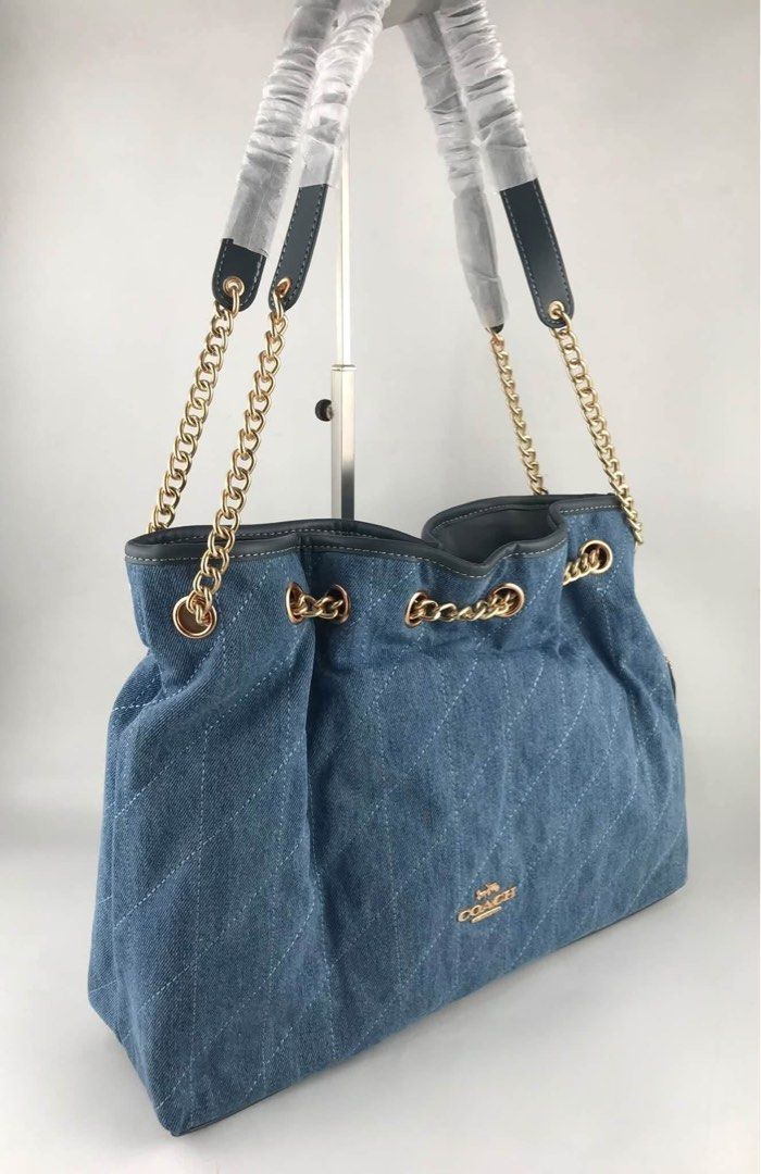 Coach bucket (Category: Cross-body Bags) located in Manila. Submitted by gff.daily_flower (Listing ID 1466592967, Image 3). Description: With tag gift receipt dustbag and paperbag.