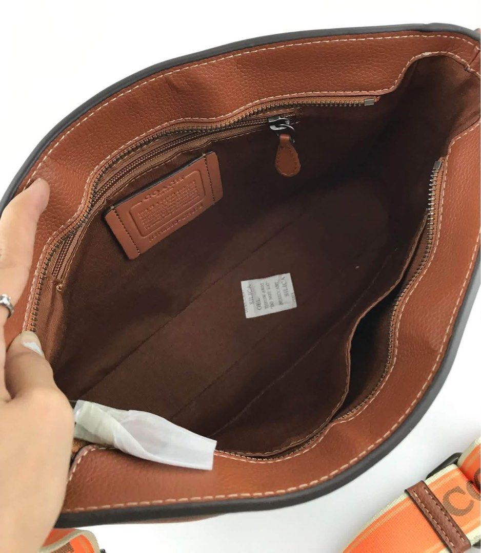 Coach crossbody (Category: Sling Bags) located in Manila. Submitted by gff.daily_flower (Listing ID 1466592725, Image 2). Description: With tag gift receipt dustbag and paperbag.