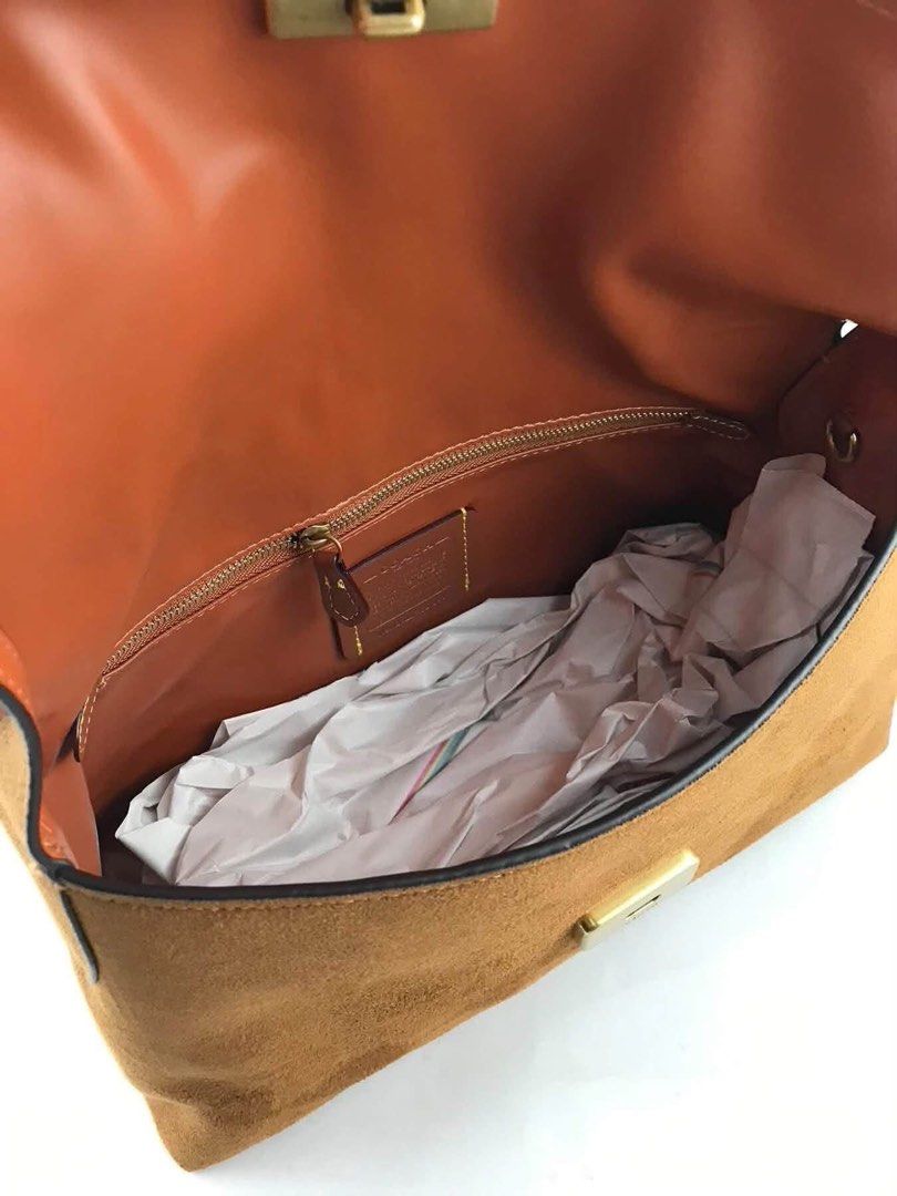 Coach crossbody (Category: Shoulder Bags) located in Manila. Submitted by gff.daily_flower (Listing ID 1466593490, Image 2). Description: With tag gift receipt dustbag and paperbag.