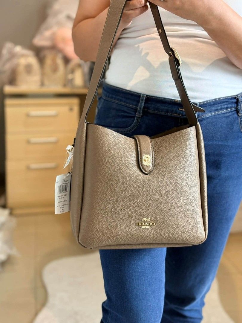Coach Hadley Convertible Hobo Bag (Category: Shoulder Bags) located in Manila. Submitted by msddirectfactoryoutlet (Listing ID 1466702423, Image 1). Description: Size 25*22*8cm.