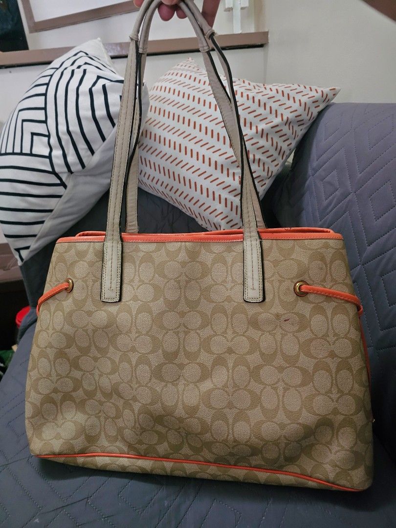 Coach Heritage Stripe Tote (Category: Tote Bags) located in Manila. Submitted by shopaholicmimi (Listing ID 1466635644, Image 2). Description: 📍orange and white brown khaki combination 📍preloved and in good condition (please see photos) not ergo, legacy, vintage, soho, saddle, demi, zoe, carly, eastwest, patchwork, rare, canvas, signature, laurel, hobo, kili.