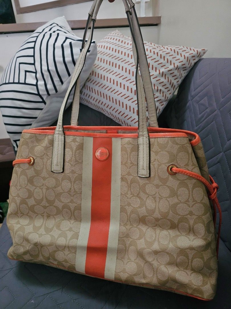 Coach Heritage Stripe Tote (Category: Tote Bags) located in Manila. Submitted by shopaholicmimi (Listing ID 1466635644, Image 1). Description: 📍orange and white brown khaki combination 📍preloved and in good condition (please see photos) not ergo, legacy, vintage, soho, saddle, demi, zoe, carly, eastwest, patchwork, rare, canvas, signature, laurel, hobo, kili.