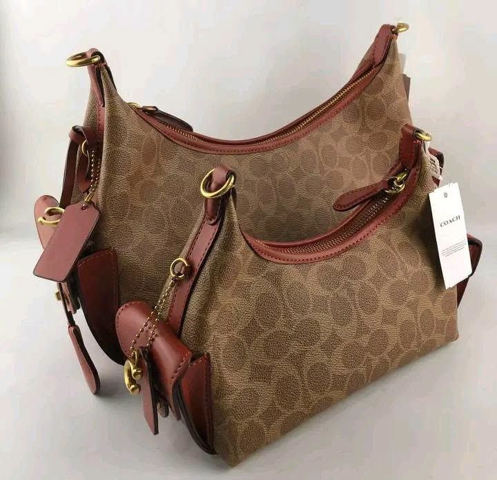 Coach Juliet Pocket Shoulder Bag (Category: Shoulder Bags) located in Manila. Submitted by msddirectfactoryoutlet (Listing ID 1466601274, Image 2). Description: Size 30 Size 30 12" (L) x 9" (H) x 5" (W) Size 22 Small 28*12*8cm.