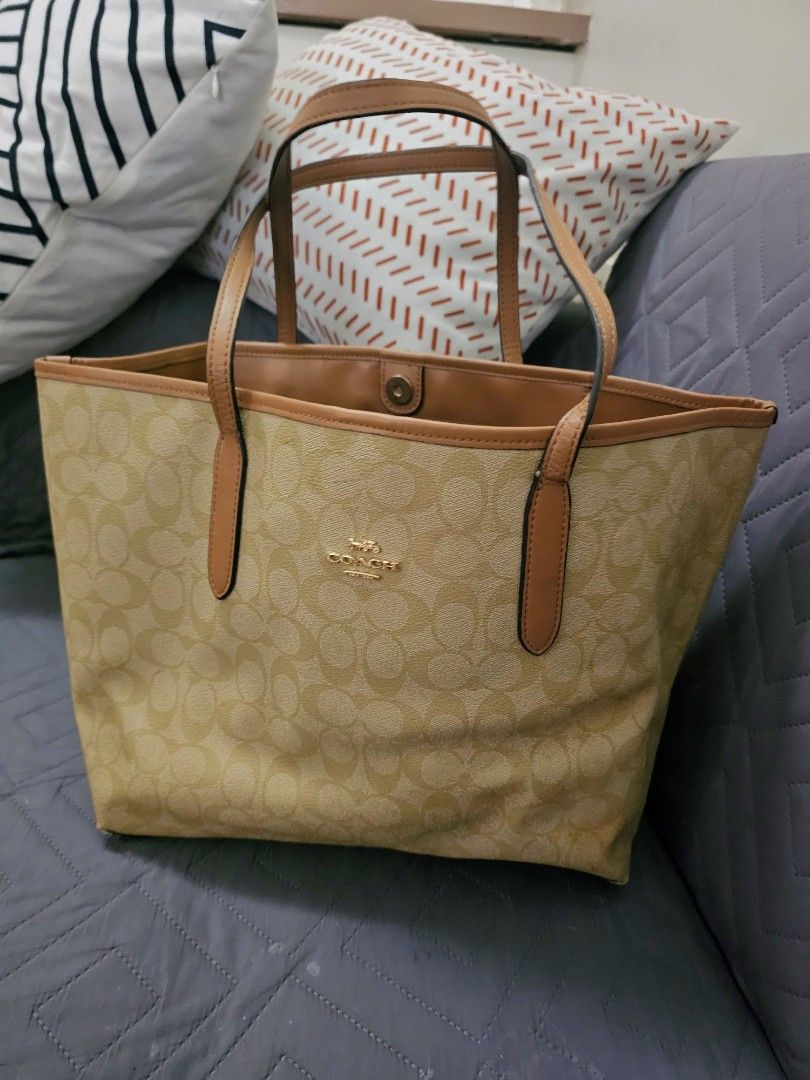 Coach Khaki City Tote (Category: Tote Bags) located in Manila. Submitted by shopaholicmimi (Listing ID 1466633689, Image 1). Description: 📍reversible khaki and brown tote bag 📍preloved and in good condition (please see photos) not ergo, legacy, vintage, soho, saddle, demi, zoe, carly, eastwest, patchwork, rare, canvas, signature, laurel, hobo, kili.