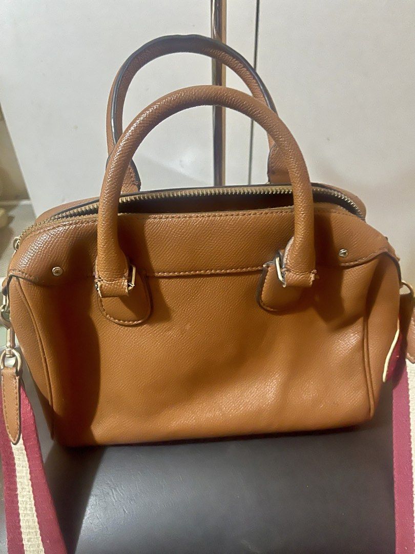 Coach Mini Bennett Satchel (Category: Luxury Bags & Wallets) located in Lucena. Submitted by bestfindsbyellie (Listing ID 1466672409, Image 3). Description: Authentic Coach In great condition With its original hangtag and sling Can be used a cross-body or hand bag in beautiful choco-brown color with cute patches design 600 only with free sf (non-negotiable) shipping via J&T location: Lucena.