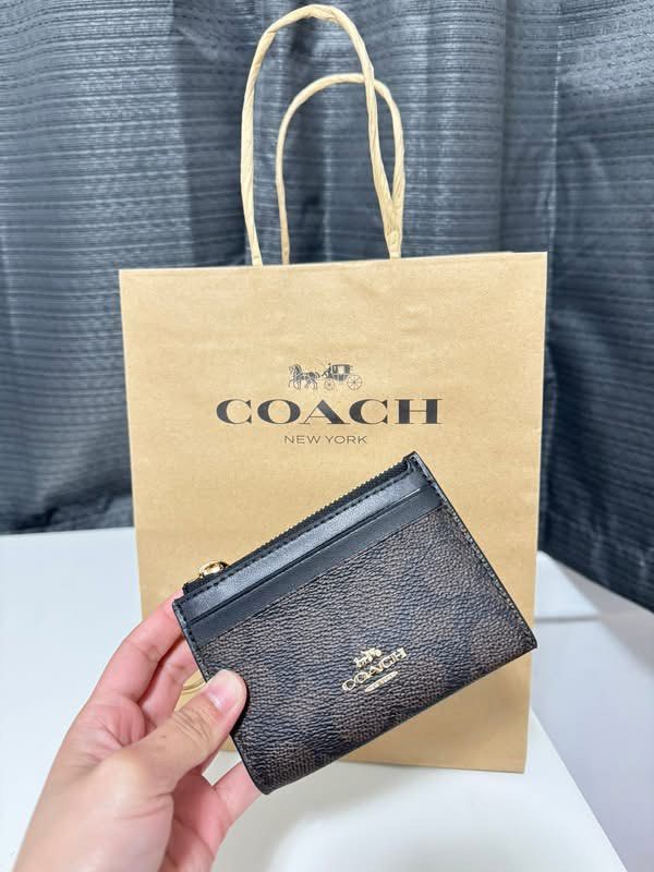 Coach Mini Wallet (Category: Wallets & Card Holders) located in San Juan, La Union. Submitted by clothedbyaya (Listing ID 1466691660, Image 1). Description: On hand Ph .