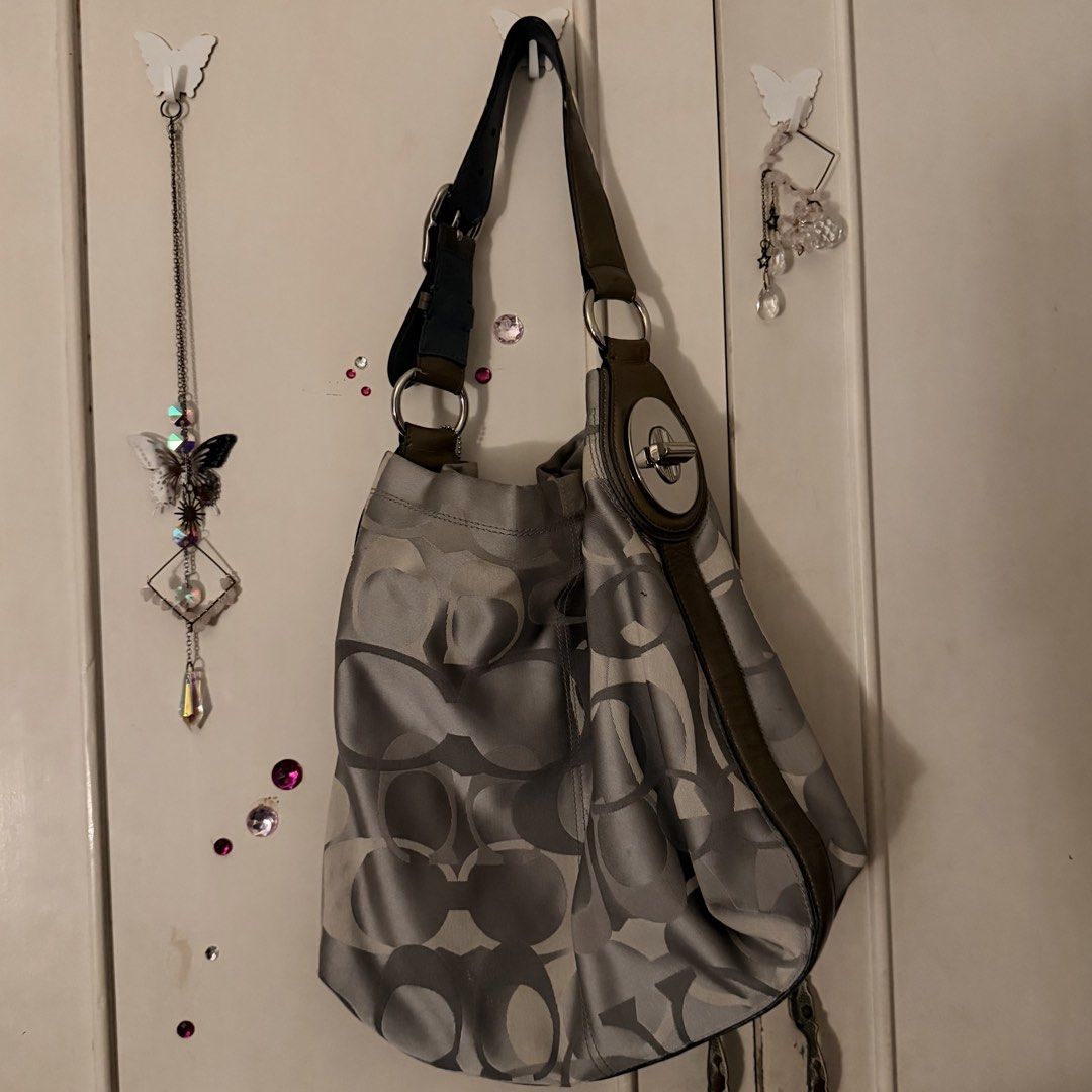 Coach Penelope Hobo Bag (Category: Shoulder Bags) located in Manila. Submitted by juliarmls (Listing ID 1466689572, Image 1). Description: • Bought in Japan last 2024 • It has paint / ink stains that I think are washable • No issues aside from the stains • Can offer but not too low !! Just message your offers 🫶🏼 .