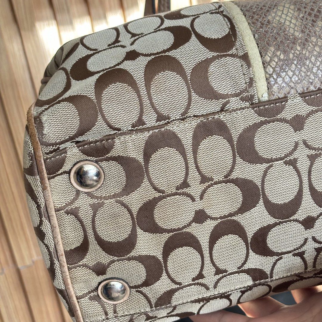 Coach Signature C Monogram Satchel with Python Print Panel (Category: Luxury Bags & Wallets) located in Bambang. Submitted by heats777 (Listing ID 1466664132, Image 3). Description: - Authentic Coach signature C monogram canvas satchel - Classic beige and brown colorway - Eye-catching center vertical panel with textured python-embossed pattern and metallic gold trim - Comfortable dual leather shoulder straps with sturdy metal hardware rings - Sec