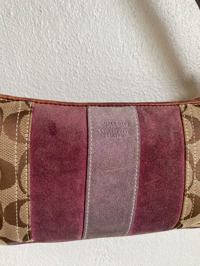 Coach Signature C Suede Stripe Shoulder (Category: Shoulder Bags) located in Caloocan City. Submitted by elisza.77wzd (Listing ID 1466746714, Image 3). Description: Authentic Coach Y2K shoulder bag featuring signature C canvas, pink and brown suede panels, and brown leather strap with a tassel accent. Zip top closure with silver hardware. Stylish and compact for everyday use. Message for inquiries!.
