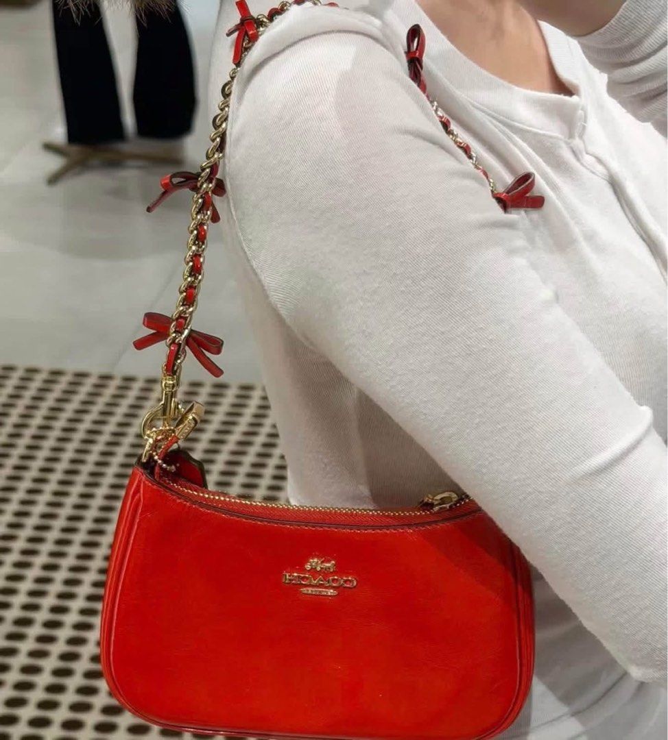 Coach sling (Category: Shoulder Bags) located in Manila. Submitted by gff.daily_flower (Listing ID 1466587808, Image 3). Description: With tag gift receipt dustbag and paperbag.
