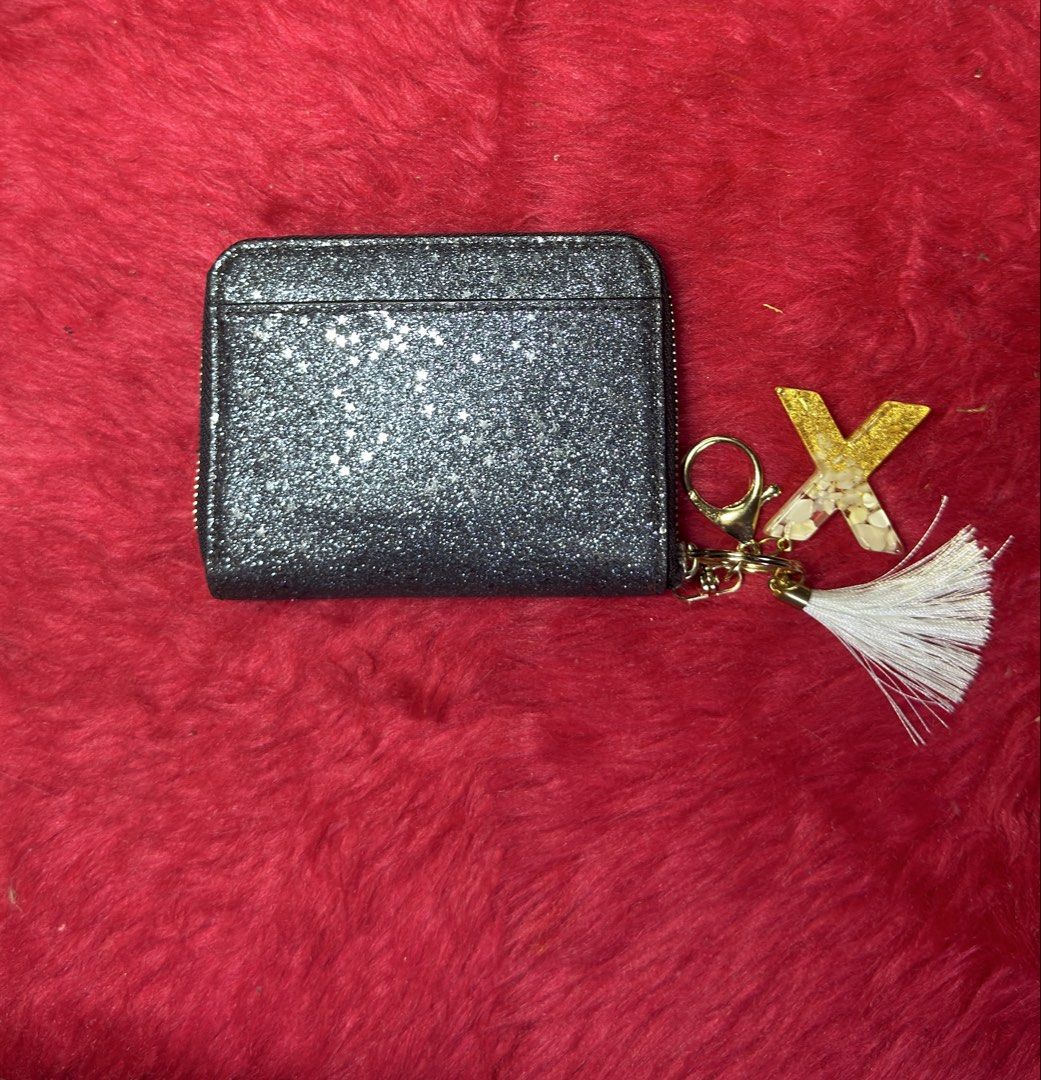 Coach Small Glitter Zip-Around Wallet (Category: Wallets & Card holders) located in Cebu City. Submitted by gabgaaab (Listing ID 1466768993, Image 2). Description: - Coach Small Glitter Zip-Around Wallet - Excellent Condition - Color: Charcoal / Black Glitter - Material: Glitter leather & gold hardware - Features: Zip-around closure - Actual pics posted.