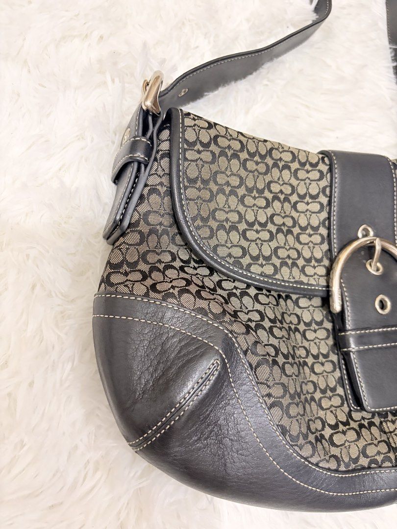 Coach Soho In black gray jacquard (Category: Luxury Bags & Wallets) located in General Santos City (Dadiangas). Submitted by thriftqueen5897 (Listing ID 1466715778, Image 2). Description: Minimal cracks in rubber lining. .