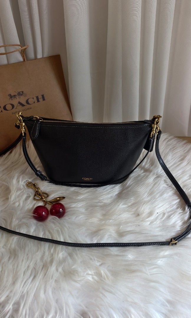 Coach two way bag (Category: Cross-body Bags) located in General Santos City (Dadiangas). Submitted by zhia_preloved (Listing ID 1466582519, Image 2). Description: band new condition 💯 Original.