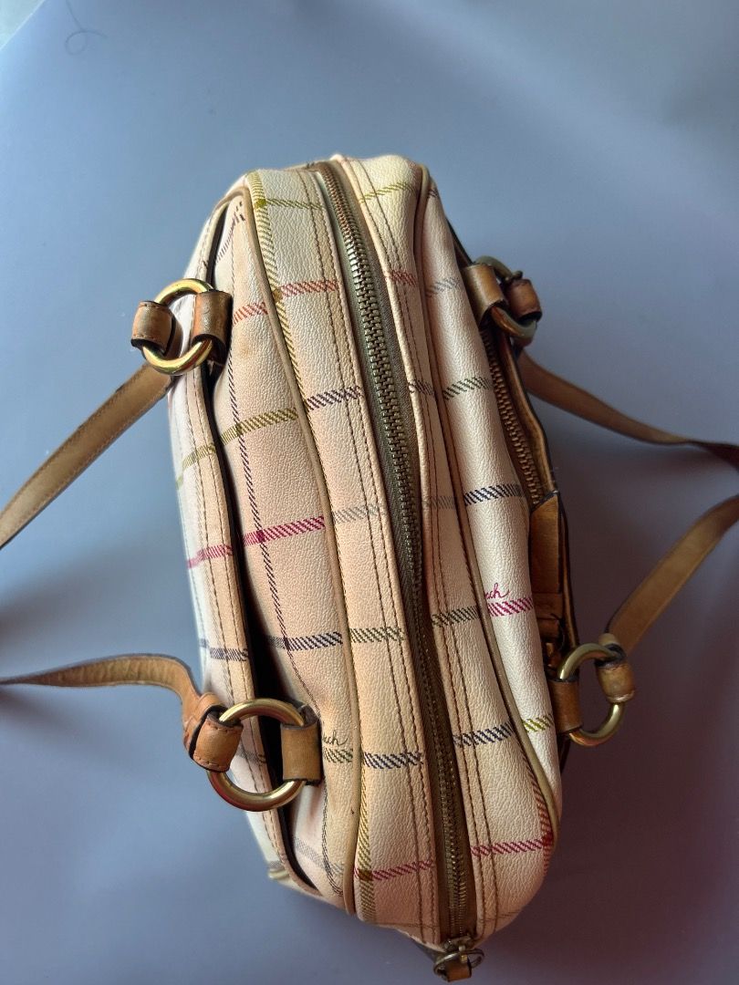 coa*h (Category: Shoulder Bags) located in Caloocan City. Submitted by maryjane.r (Listing ID 1466568893, Image 3). Description: ✔️ Model: Coach Tattersall 11553 - Vintage 2000s ✔️ Pattern: Beige Tattersall Tartan / Check - rare! ✔️ Material: Coated canvas + vachetta leather trim ✔️ Patch: Oval Coach pink enamel patch + Coach script ✔️ Hardware: Gold O-rings, gold studs, YKK zipper ✔️ With Coach leather hangtag + ball chain ✔️ Size: Medium - kasy