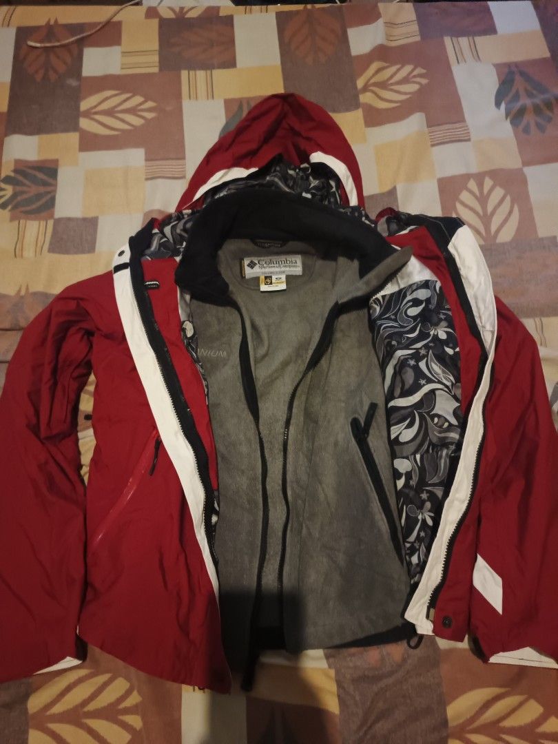 Columbia titanium jacket (Category: Activewear) located in Odiongan. Submitted by thriftngo26 (Listing ID 1466770137, Image 2). Description: This appears to be a red and white Columbia Titanium Omni-Tech interchange winter ski jacket with a detachable hood and an inner gray fleece layer.