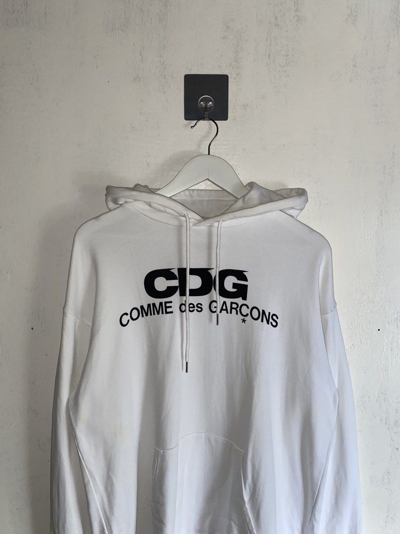 Comme des Garcons - Printed Logo Hoodie (Category: Hoodies) located in Puerto Princesa. Submitted by something___. (Listing ID 1466640787, Image 3). Description: Comme des Garcons - Printed Logo Hoodie Tagged Size: XXL Dimensions Length: 29 Width: 24 Condition: Excellent Color rate: 9.5 Flaws: Needs some light wash.