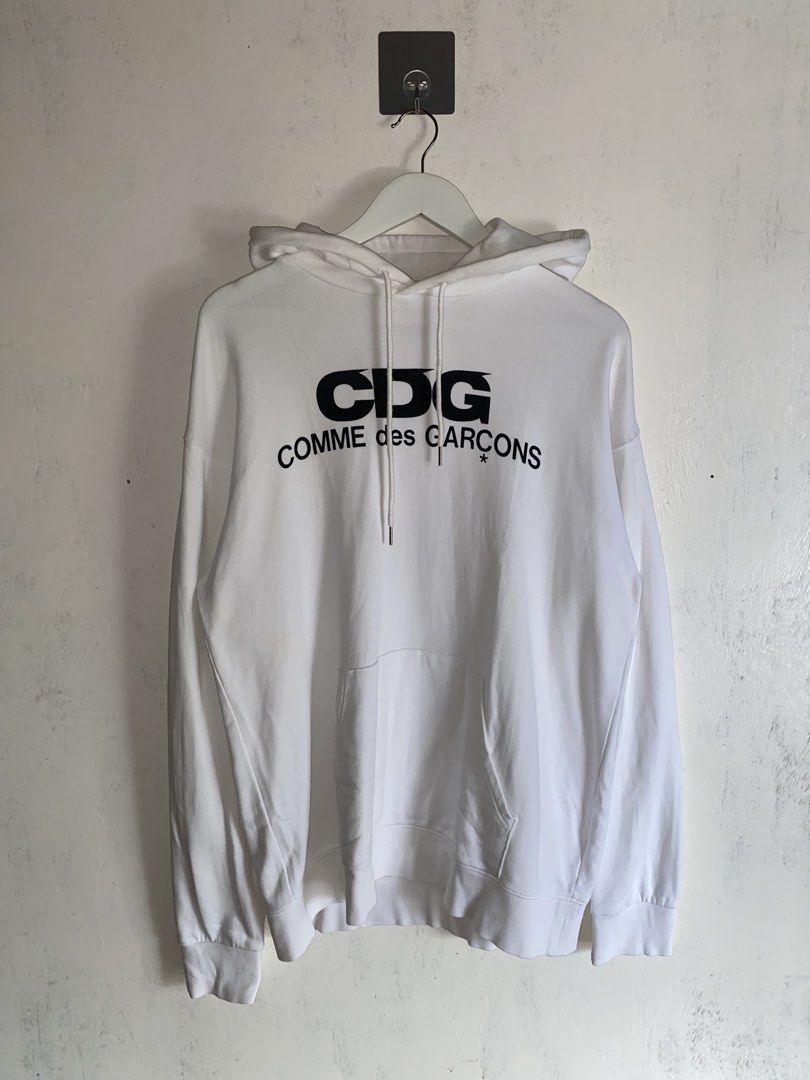 Comme des Garcons - Printed Logo Hoodie (Category: Hoodies) located in Puerto Princesa. Submitted by something___. (Listing ID 1466640787, Image 1). Description: Comme des Garcons - Printed Logo Hoodie Tagged Size: XXL Dimensions Length: 29 Width: 24 Condition: Excellent Color rate: 9.5 Flaws: Needs some light wash.