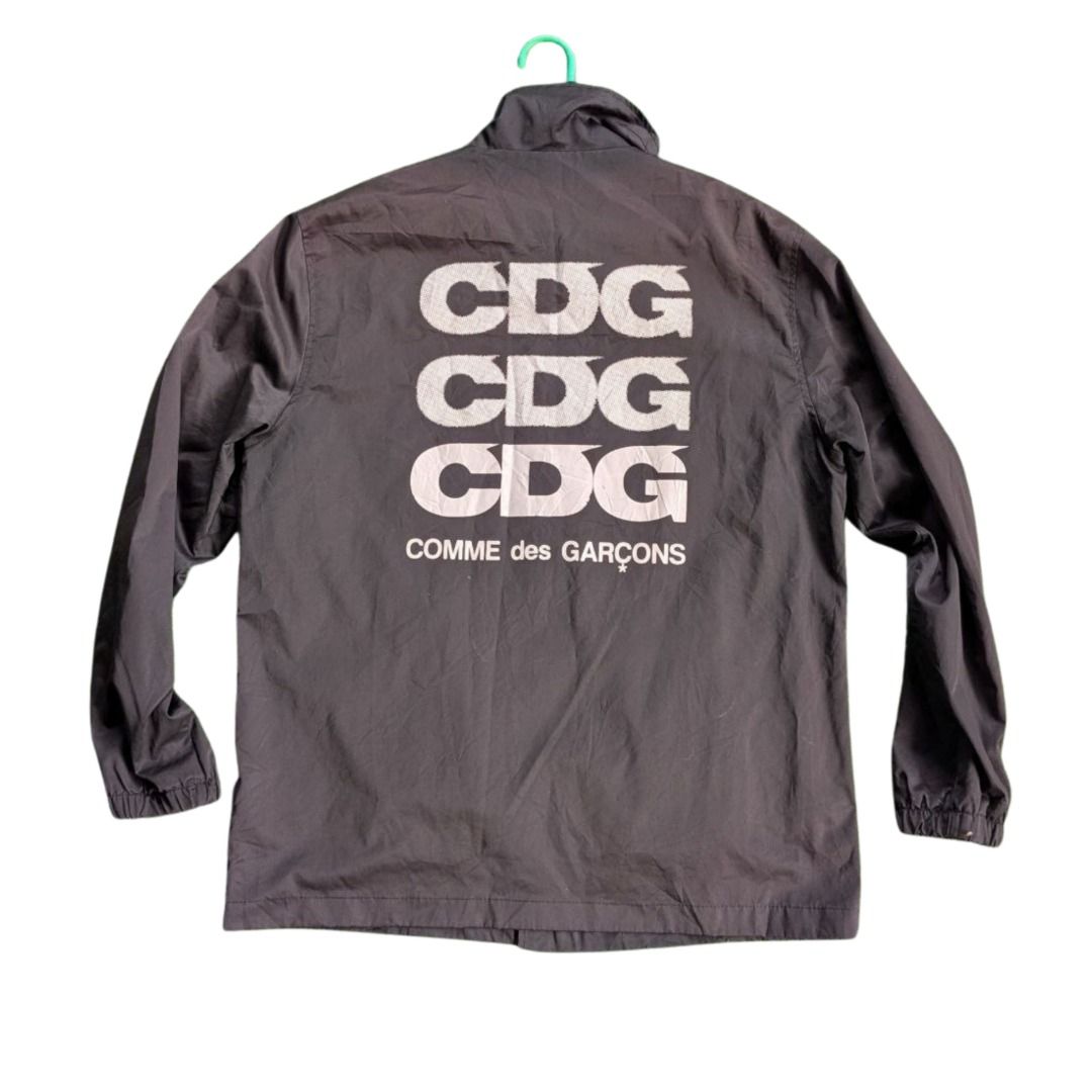 Comme des Garcons Coach Jacket | Good Design Shop (Category: Coats, Jackets and Outerwear) located in Quezon City. Submitted by julyissue (Listing ID 1466714889, Image 1). Description: Produced under the "Good Design Shop" collaboration line Not Authenticated | Buy at your own Risk Condition 5/10 Hardware Flaws: Several snap buttons are dented / damaged. Only 4 snap buttons are currently functional/closable..