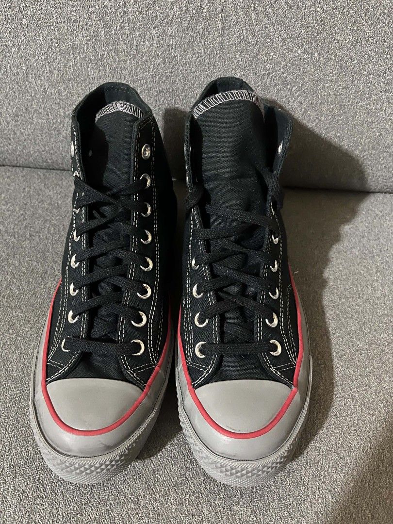Converse Chuck 70 High Top Black Grey Red (Category: Sneakers) located in General Santos City (Dadiangas). Submitted by vashcollection16 (Listing ID 1466595731, Image 2). Description: - Brand: Converse Chuck 70 High Top - Color: Black canvas upper with stylish grey rubber toe cap and midsoles - Details: Eye-catching red piping along the sole edge and classic metal eyelets - Sole: Vintage brown diamond-pattern rubber outsole with Converse All Star