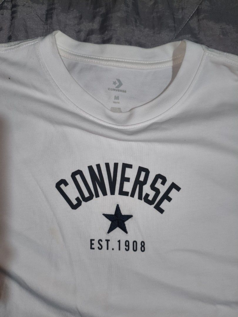 Converse White Graphic Tee Size M (Category: Shirts) located in Polangui. Submitted by quongmarka50283 (Listing ID 1466674936, Image 3). Description: dimes:25/19 color rate:9/10 nees wash.