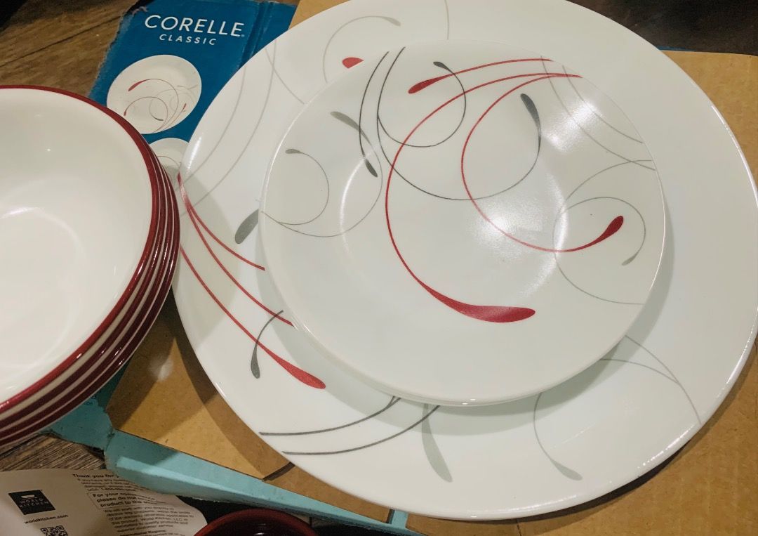 16 PC Set Corelle Classic Splendor Dinnerware Set with Mugs (Category: Dinnerware & Cutlery) located in San Juan City. Submitted by ajportucel51461 (Listing ID 1466725253, Image 1). Description: - Authentic Corelle Classic Dinnerware Set in Splendor pattern - Includes dinner plates, smaller plates, bowls with red rims, and 4 red mugs - Design: Elegant white glass base with modern red and grey swirl accents - Material: Sturdy, lightweight, and bre