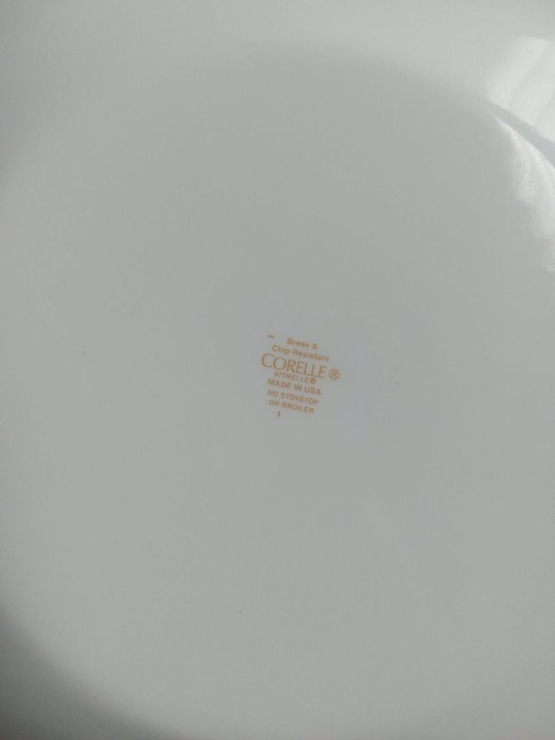 Corelle Square Vitrelle Dinner Plate Tree Silhouette Pattern (Category: Dinnerware & Cutlery) located in Marikina City. Submitted by ikid6121 (Listing ID 1466657457, Image 1). Description: - Authentic Corelle square plate, proudly Made in USA - Crafted from durable, break- and chip-resistant Vitrelle glass - Elegant white background with a modern grey tree and branch silhouette - Clearly visible backstamp guaranteeing authenticity - Microwave and