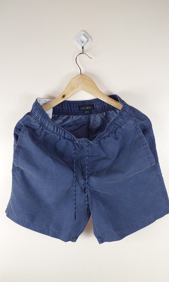 COTTON ON NOMAD BAGGY SHORTS (Category: Luxury Apparel) located in Pozorrubio. Submitted by infinite_grind_0.1 (Listing ID 1466603157, Image 1). Description: 🔥 BRAND NEW WITH TAGS 🔥 COTTON ON NOMAD BAGGY SHORTS ₱1,550. ✅ (way below srp of ₱2,999❌) Size: International XS on tag On tape W28 can do 30 — 100% original — brand new with Tags MEET UP 🤝🏻 | PICK UP📍| SHIP 📦 📍Pozorrubio 📍Pangasinan Direct message ! 📥📨 #MensShortsPH #NavyBlueShort