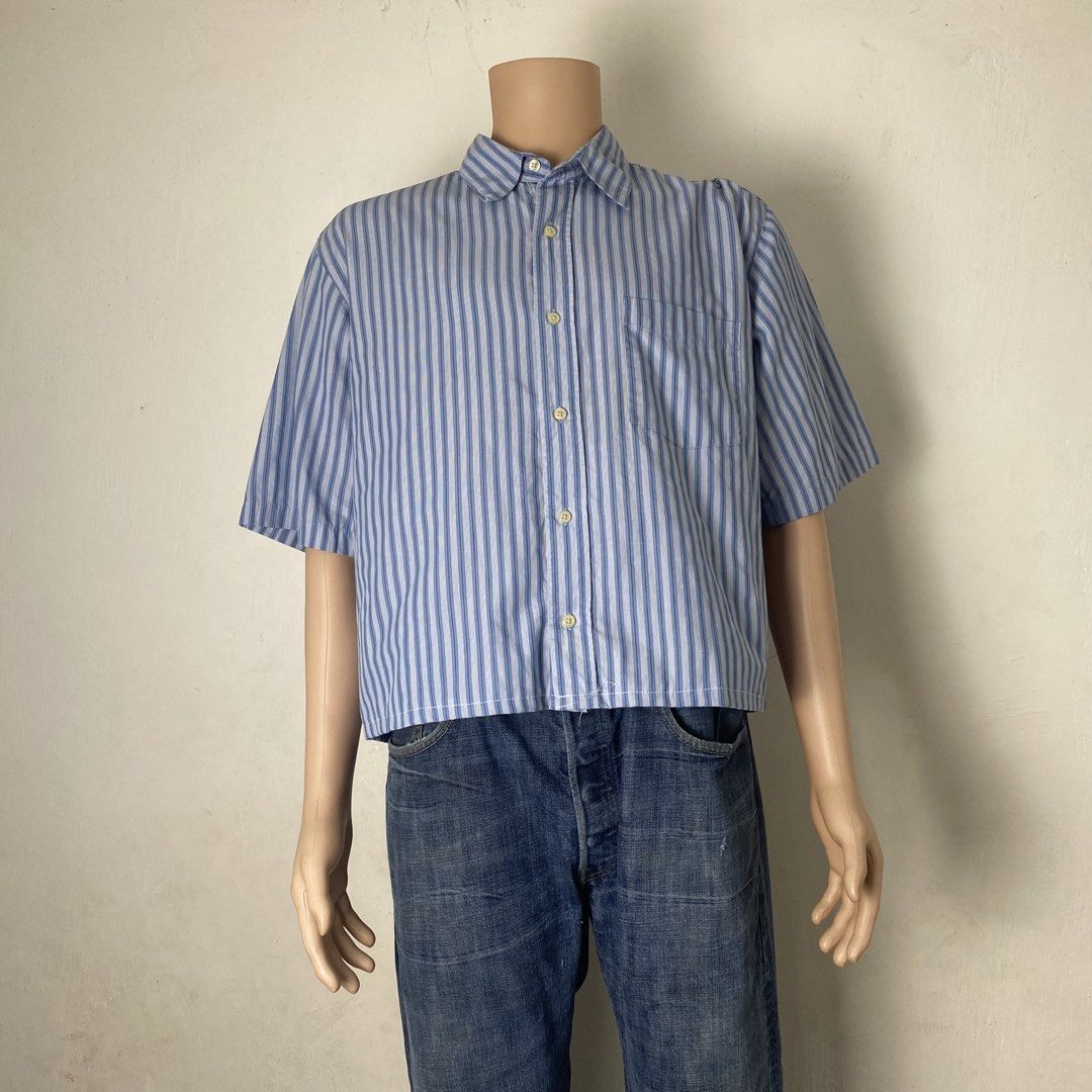 COVINGTON 👕| Blue Pinstripes Crop Polo (Category: Tshirts & Polo Shirts ) located in Bulacan. Submitted by orc.ph (Listing ID 1466648769, Image 2). Description: COVINGTON 👕| Blue Horizontal Design Crop Polo Material Used: Cotton - Blue - Short Sleeve - Single Pocket - Button up - button closure - Horizontal Design - Semi Formal - Formal - Streetwear - Crop Polo Size: L Width: 22 Length: 22 Pristined Condition. No Visible Flaws. No Issue At All 
