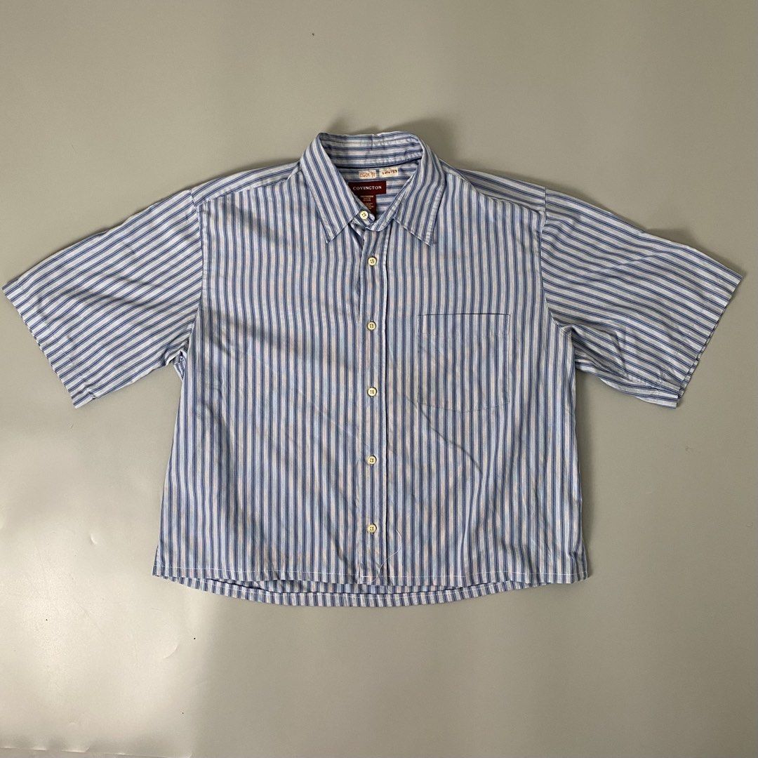 COVINGTON 👕| Blue Pinstripes Crop Polo (Category: Tshirts & Polo Shirts ) located in Bulacan. Submitted by orc.ph (Listing ID 1466648769, Image 1). Description: COVINGTON 👕| Blue Horizontal Design Crop Polo Material Used: Cotton - Blue - Short Sleeve - Single Pocket - Button up - button closure - Horizontal Design - Semi Formal - Formal - Streetwear - Crop Polo Size: L Width: 22 Length: 22 Pristined Condition. No Visible Flaws. No Issue At All 