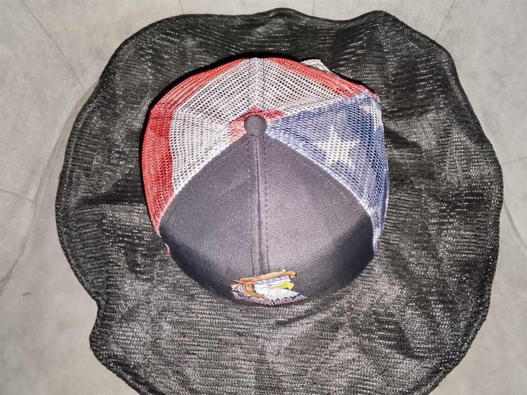 Cowboy Snapback "Merica" Mullet Eagle Trucker Hat (Category: Caps & Hats) located in Binangonan. Submitted by yuristalin888 (Listing ID 1466584911, Image 3). Description: Make a bold statement with this unique **Cowboy Snapback trucker hat**, featuring a striking graphic of a **mullet-rocking bald eagle** and the word **"MERICA"** on the front panels. Designed with **breathable mesh backing** in a patriotic red, white, and blue pattern and an **a