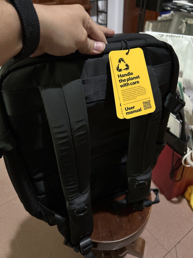 Crash Baggage Black Backpack (Category: Backpacks) located in Alitagtag. Submitted by patrickvillanueva (Listing ID 1466628076, Image 3). Description: - Brand: Crash Baggage - Color: Black - Design: Iconic dent-look hard shell - Straps: Adjustable, padded with D-rings - Features: Convenient side pockets, top zipper closure - Details: Includes signature yellow user manual tag - Condition: Heavily used. Good condition - Shipping: Ships fast via J&T