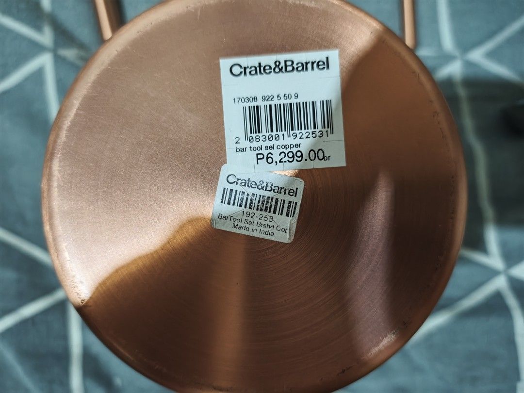 Crate & Barrel Brushed Copper Bar Tool Set (Category: Dinnerware & Cutlery) located in Caloocan City. Submitted by deyburds. (Listing ID 1466720111, Image 2). Description: - Brand: Crate & Barrel - Material/Finish: Brushed copper - Origin: Made in India - Includes: Strainer, jigger, ice scoop, and other cocktail accessories with a matching holder - Condition: Brand new with original store price tag (₱6,299) still attached - Ideal for home bar set