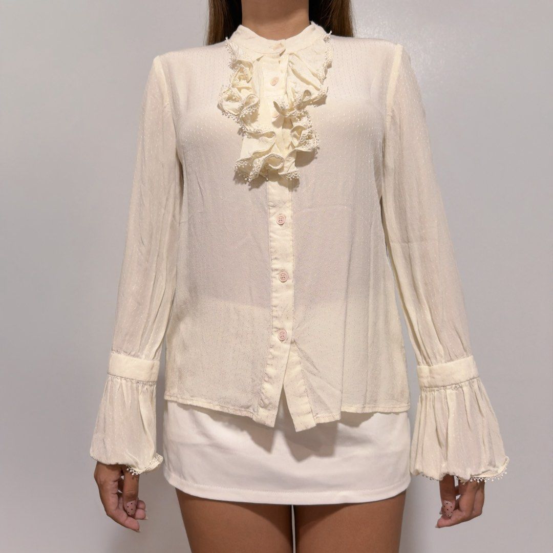 cream bell sleeve button down (Category: Longsleeves) located in Cebu City. Submitted by cuteoncue (Listing ID 1466762971, Image 3). Description: small-med m on tag.